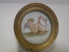 J THORLEY "Cherub", watercolour on porcelain back, signed lower right, image including frame 9.