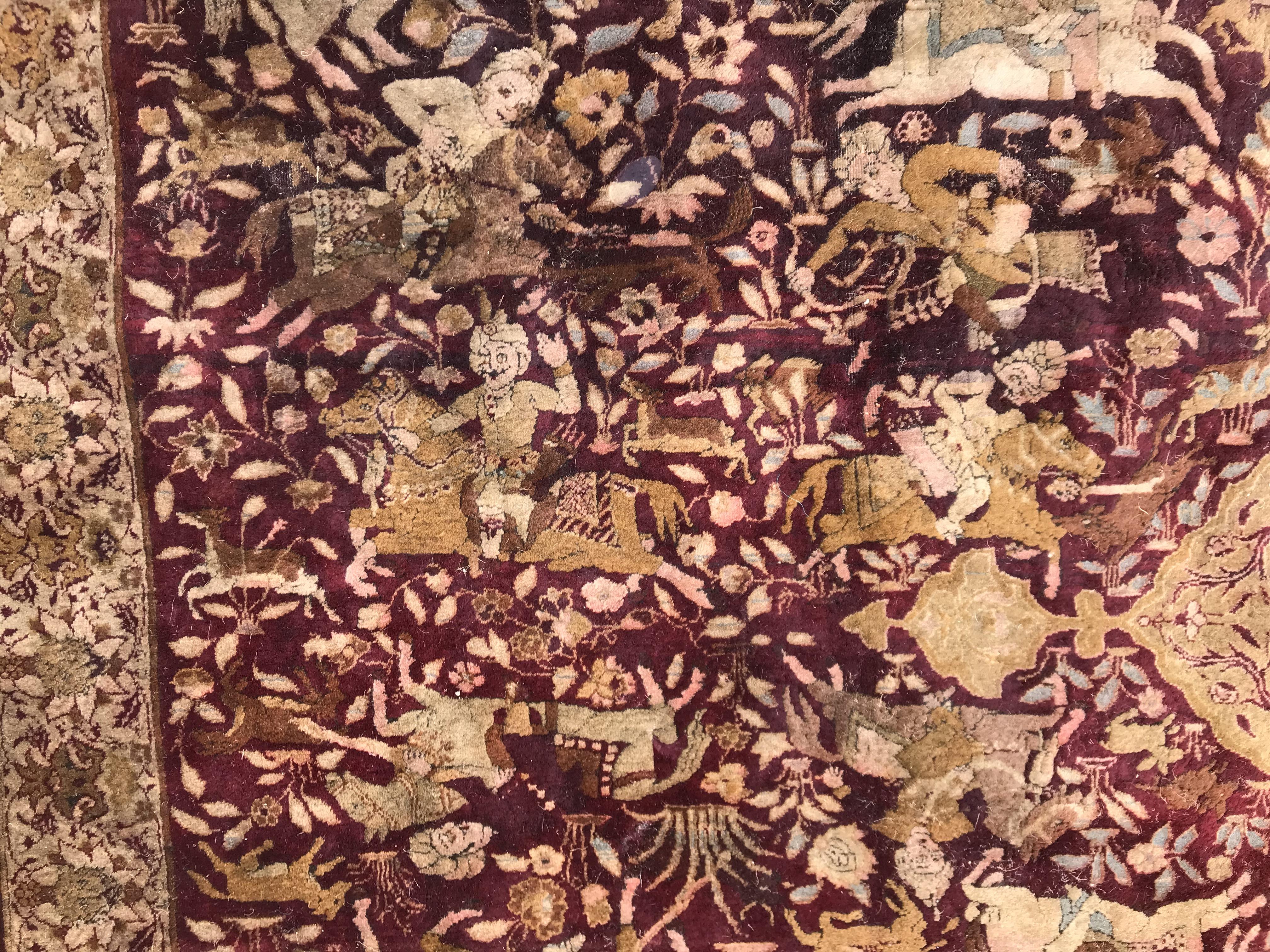 An early 20th Century Agra North India carpet with centre medallion on a wine-coloured ground, - Image 46 of 103