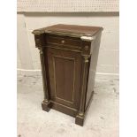 A Russian mahogany and brass embellished pot cupboard with single drawer over cupboard door,