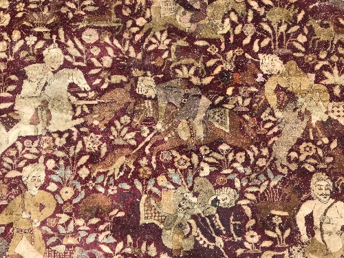 An early 20th Century Agra North India carpet with centre medallion on a wine-coloured ground, - Image 29 of 103