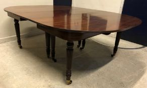 A 19th Century mahogany D-end dining table,