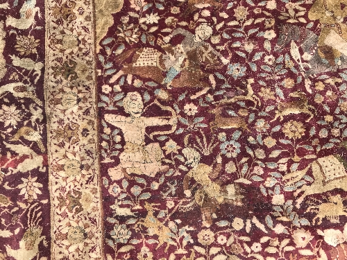 An early 20th Century Agra North India carpet with centre medallion on a wine-coloured ground, - Image 37 of 103