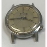 A stainless steel cased Bulova Accutron gentleman's wristwatch with silvered dial and plain batons,