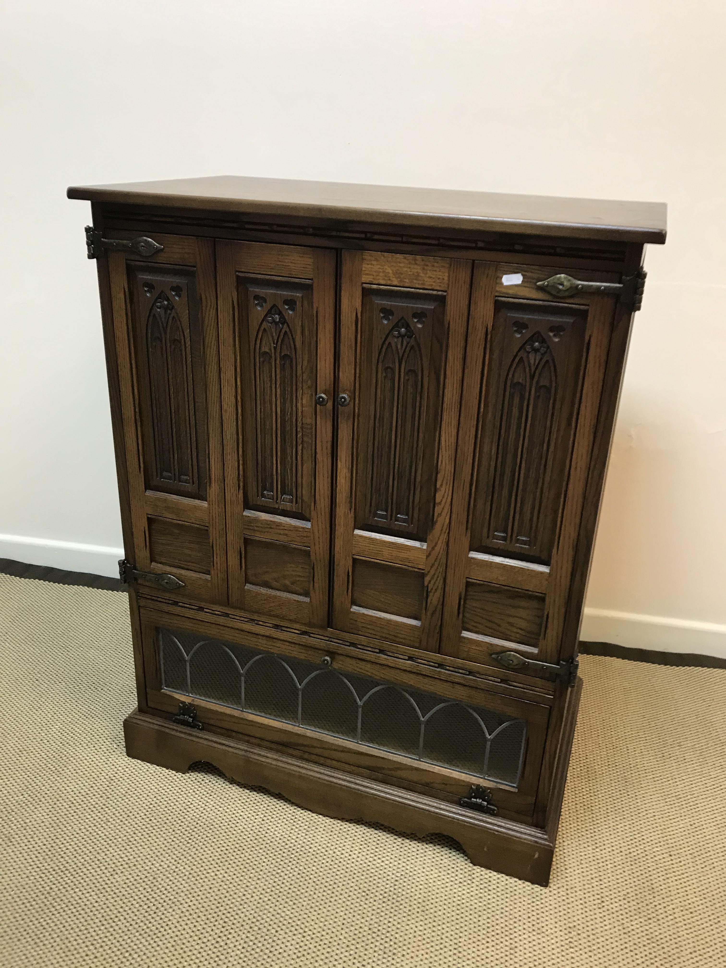 An Old Charm oak tv cabinet,