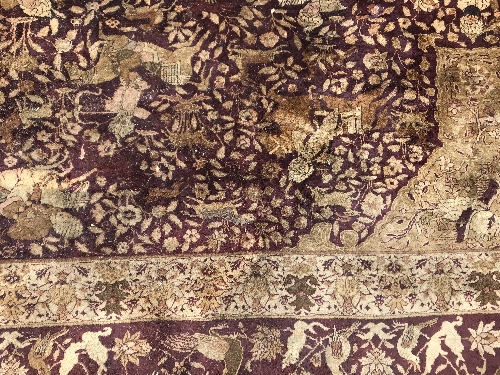 An early 20th Century Agra North India carpet with centre medallion on a wine-coloured ground, - Image 73 of 103