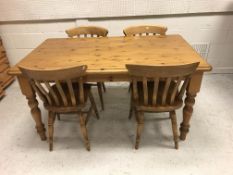 A modern pitch pine rectangular farmhouse style kitchen table on turned legs, 91.