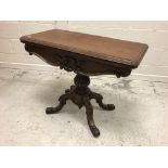 A Victorian mahogany card table,