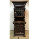 A Victorian carved oak Gothic Revival cabinet,