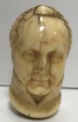 A 19th Century carved ivory cane handle as a head of the Duke of Wellington, inscribed “Mr.