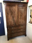 An early 19th Century mahogany linen press,