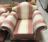 A modern pink and cream striped patterned upholstered scroll arm three piece suite comprising three