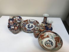 A collection of late 19th/early 20th Century Japanese pottery comprising two Imari plates,