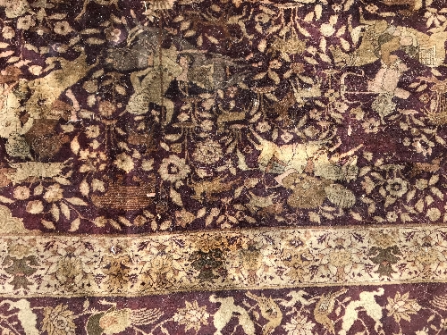 An early 20th Century Agra North India carpet with centre medallion on a wine-coloured ground, - Image 74 of 103