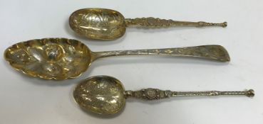 An Edwardian silver gilt annointing spoon with engraved decoration in the Medieval manner (by