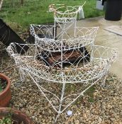 A painted wirework three tier D shaped plant stand,