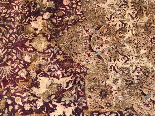 An early 20th Century Agra North India carpet with centre medallion on a wine-coloured ground, - Image 48 of 103