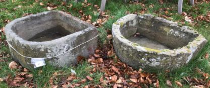 Two natural stone D shaped troughs, 56 cm x 53 cm x 25 cm high and 63.5 cm x 55.