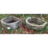 Two natural stone D shaped troughs, 56 cm x 53 cm x 25 cm high and 63.5 cm x 55.