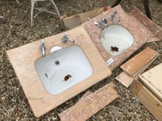 Two modern bathroom sinks with Rosso marble and Sienna type marble tops,