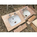 Two modern bathroom sinks with Rosso marble and Sienna type marble tops,