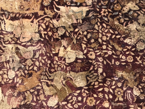 An early 20th Century Agra North India carpet with centre medallion on a wine-coloured ground, - Image 55 of 103