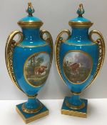 A pair of Vicrorian Minton bleu celeste ground vases in the Classical style,