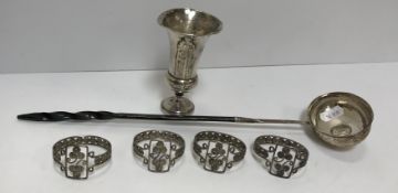 A George III silver whale bone handle punch ladle, the coin to the bowl dated 1787, 34.