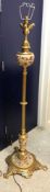 A circa 1900 gilt brass and pottery telescopic lamp standard (formerly oil, now electric),