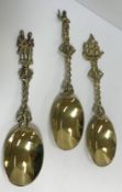 A set of three Victorian silver gilt spoons in the 18th Century German taste with figural / ship
