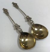 A pair of Victorian silver Apostle spoons in the 17th Century manner with cherubic and barley-twist