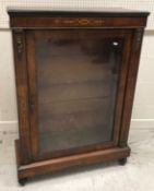 A Victorian walnut and marquetry inlaid single glazed door side cabinet on turned feet, 74.