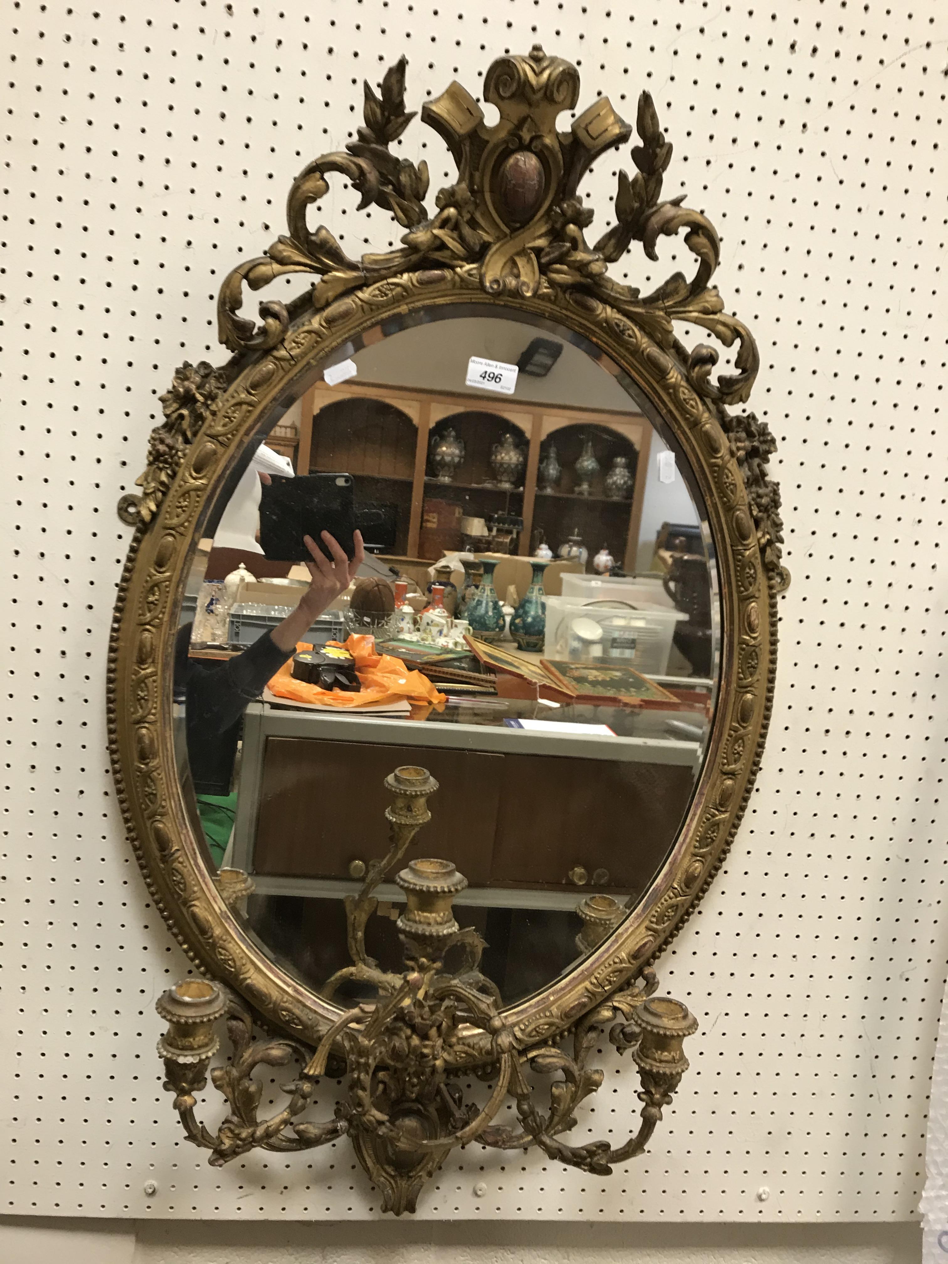 A 19th Century giltwood and gesso framed girandole mirror with all over foliate decoration - Image 2 of 2