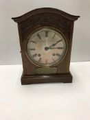 A circa 1900 mahogany cased mantel clock,