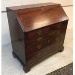 A George III mahogany bureau,