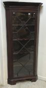 A 19th Century mahogany freestanding corner cabinet,