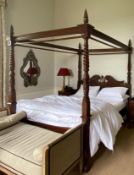 A modern Indonesian teak and carved four-poster bedstead in the 19th Century manner,