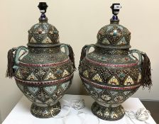 Two modern Eastern white metal mounted and glazed pottery table lamps of vase form,