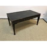 A Chinese black lacquered and gilt decorated coffee table (lacquer very cracked and gilding worn),