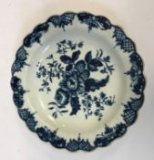 An 18th Century Worcester fruit and hop pattern dish with scalloped edge, 17.