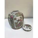 A modern Chinese famille rose decorated ginger jar, bears a character mark to base, 26.