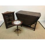 A Victorian rosewood and cross-banded octagonal centre table on turned legs united by an undertier,