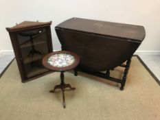 A Victorian rosewood and cross-banded octagonal centre table on turned legs united by an undertier,