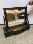 A 19th Century mahogany toilet mirror,