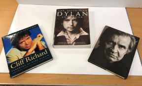 A collection of various books to include "The Definited Dylan Songbook",