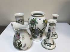 A collection of Portmerion botanic garden china to include salad bowls, vases, pair of candlesticks,