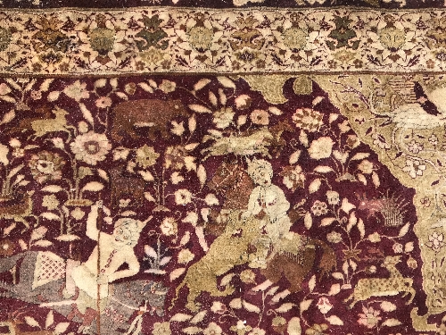 An early 20th Century Agra North India carpet with centre medallion on a wine-coloured ground, - Image 22 of 103