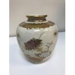 A Satsuma vase decorated with floral sprays and butterflies,