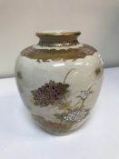 A Satsuma vase decorated with floral sprays and butterflies,