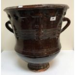 A large twin-handled stoneware jar, 55 cm high, together with an ocean find terracotta jug,