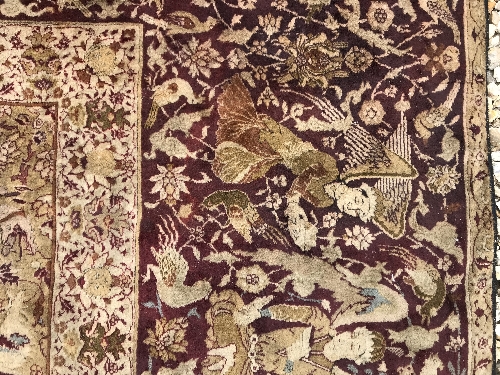 An early 20th Century Agra North India carpet with centre medallion on a wine-coloured ground, - Image 20 of 103